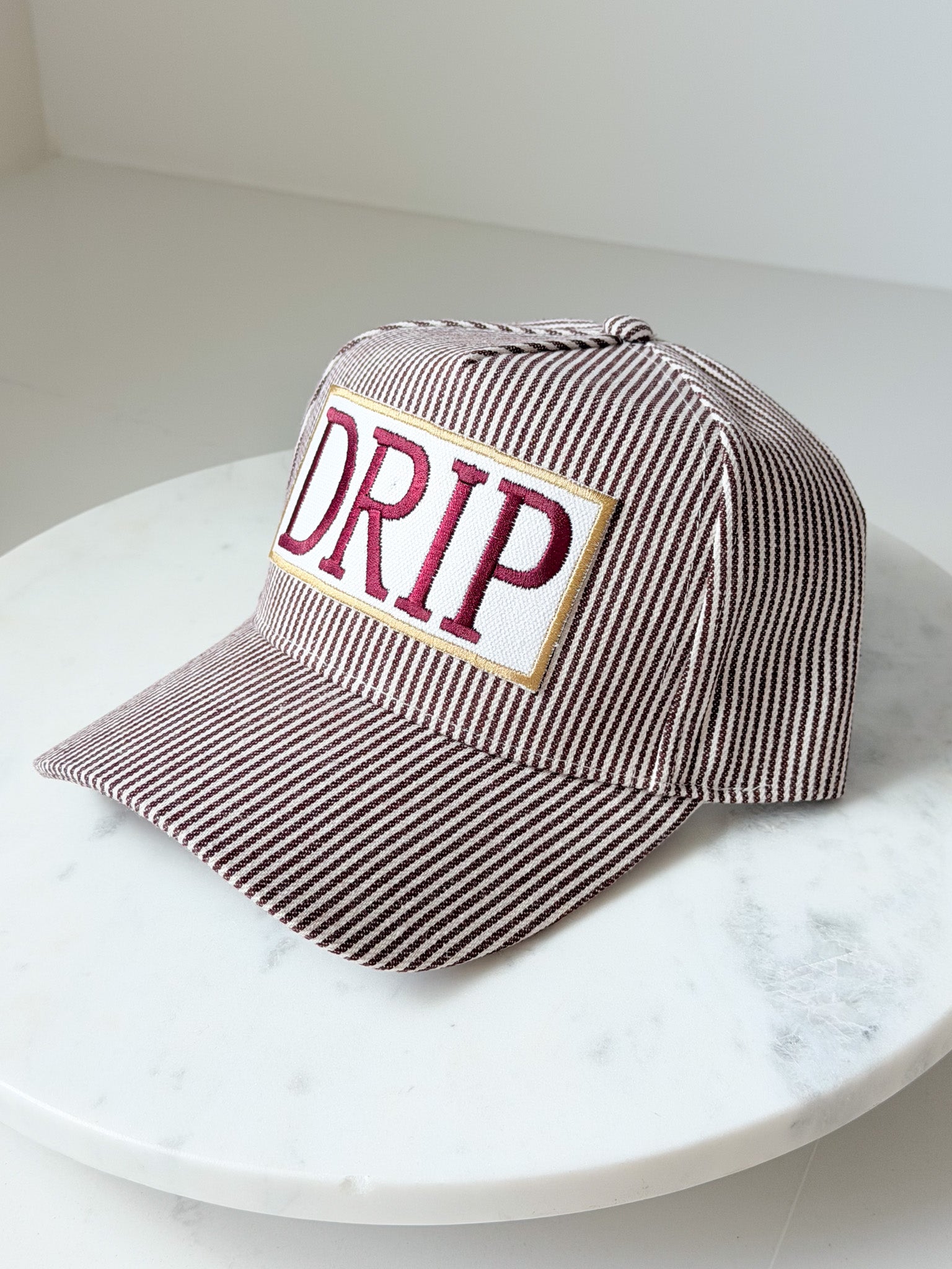 Maroon Stripe Drip Trucker