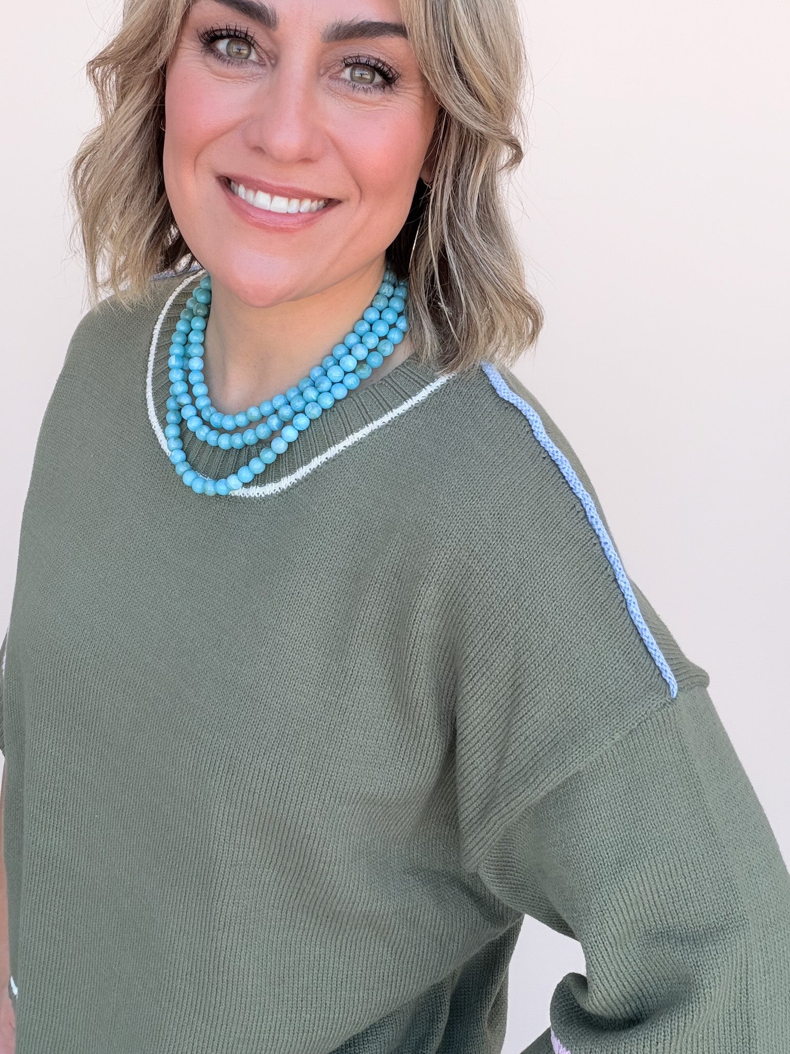 Out of Line Knit Top