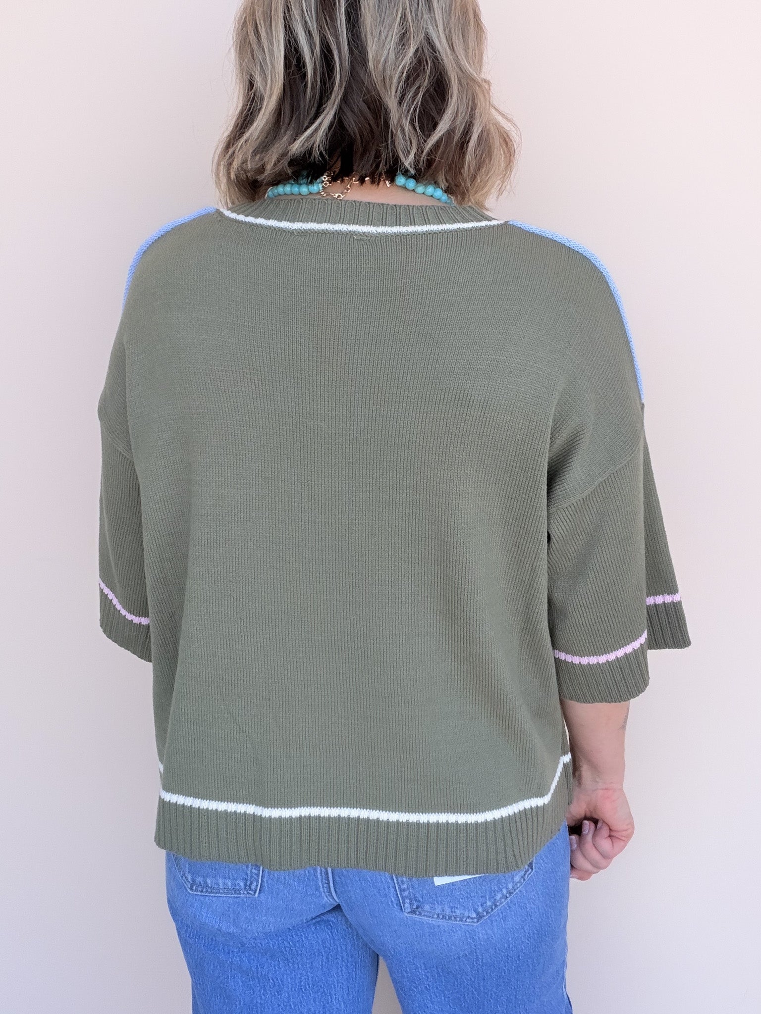 Out of Line Knit Top