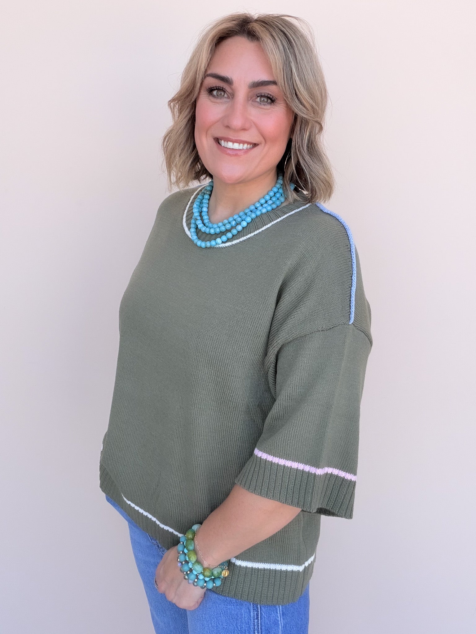 Out of Line Knit Top